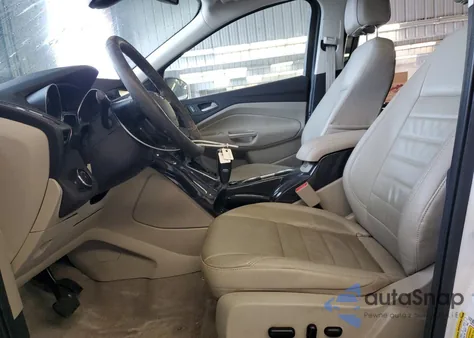 2014 Ford Escape Titanium z USA, uszkodzony, nr VIN 1FMCU0J90EUB60664